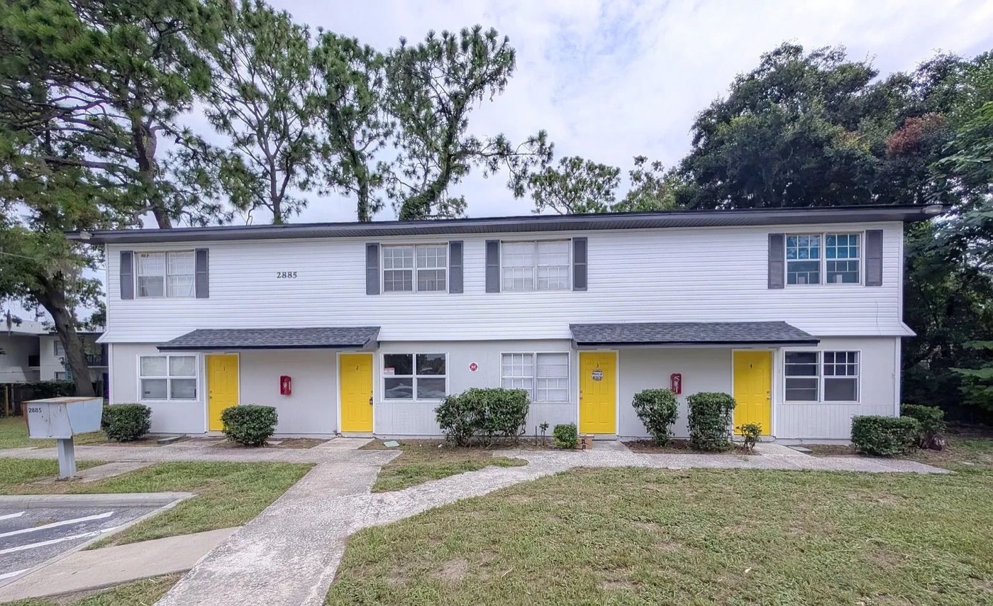 Yellow Pine townhomes and green lawn